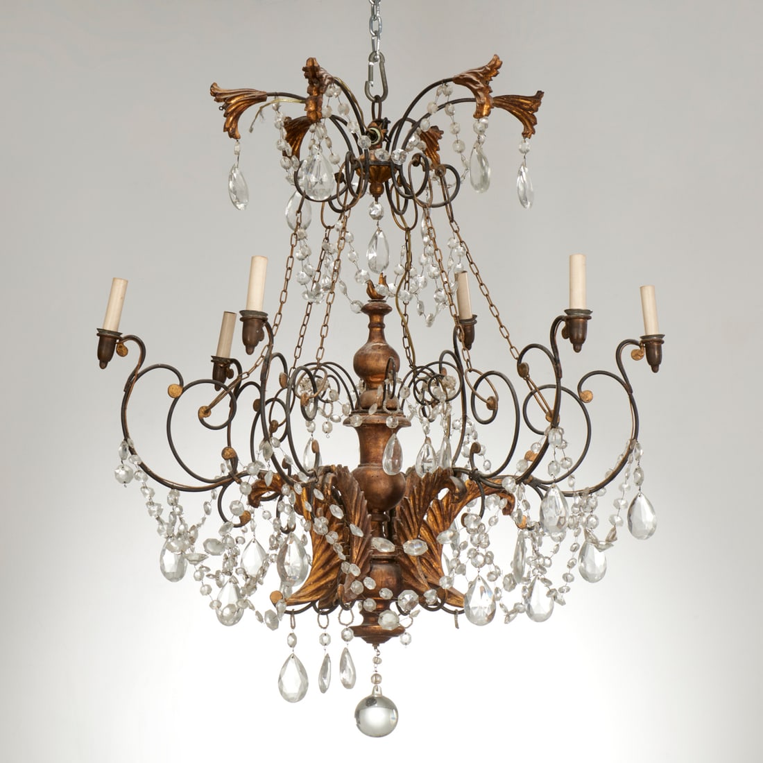 Antique Venetian glass and giltwood chandelier: Antique Venetian glass and giltwood chandelier, 19th c., six-lights, wrought metal frame with gilt foliate scrolls, glass drop swags, approx. 38"h x 33"dia Provenance: The Iris Apfel Collection