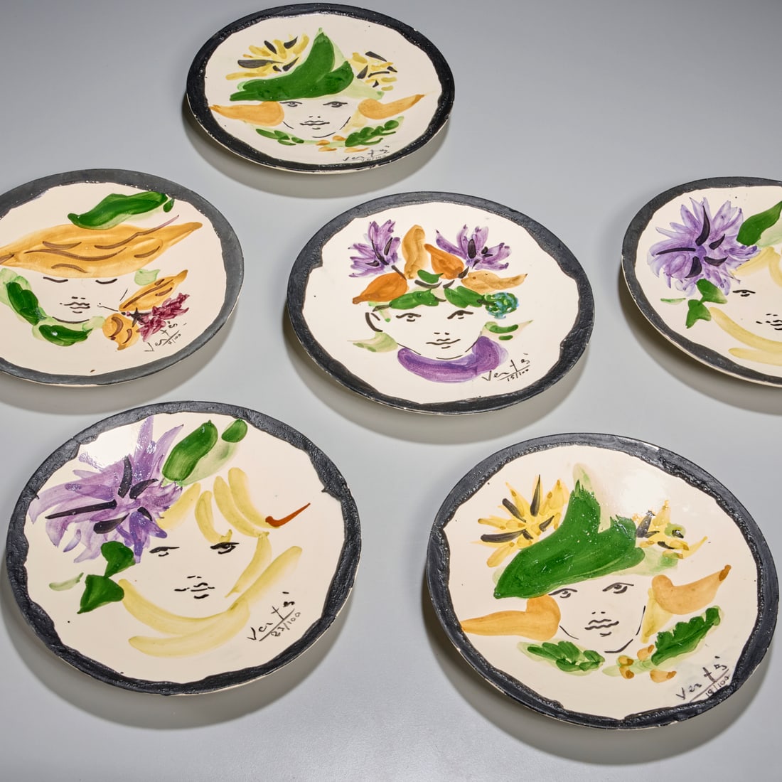 Marcel Vertes, set (6) Vallauris pottery plates: Marcel Vertes, set (6) Vallauris pottery plates, c. 1950s, France, decorated with floral portraits, each signed and numbered edge, marked underside, each 8.75"dia Provenance: A Private Collection: