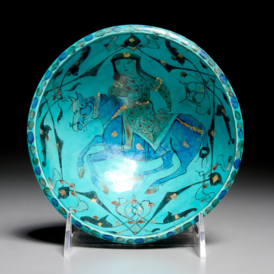 Mina'i turquoise glaze pottery bowl, ex museum: Mina'i turquoise glaze pottery bowl, ex museum, c. 1100-1200, Central Iran, parcel gilt decorated with horse rider and vegetal motifs, inventory number inscribed underside, 2.5"h x 6"dia Provenance: W