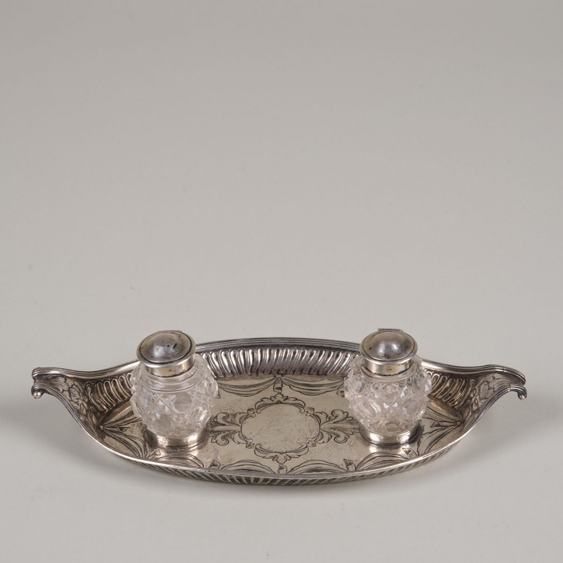 Victorian sterling silver and glass ink stand: Victorian sterling silver and glass ink stand: London, circa 1886, 2.25"h x 9.25"l x 4.25"w, approx. 5.5 ozt. (weighable)
