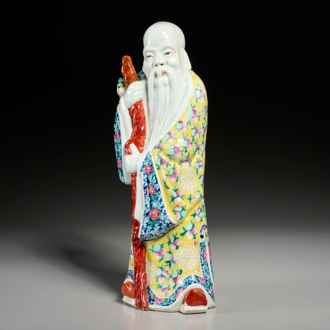 Large Chinese porcelain figure of Shoulao: Large Chinese porcelain figure of Shoulao, 19th/20th c., polychrome enamel decoration, faint mark to underside, 16"h x 6"w x 4.5"d Provenance: A Private Collection: 1095 Park Avenue, NYC