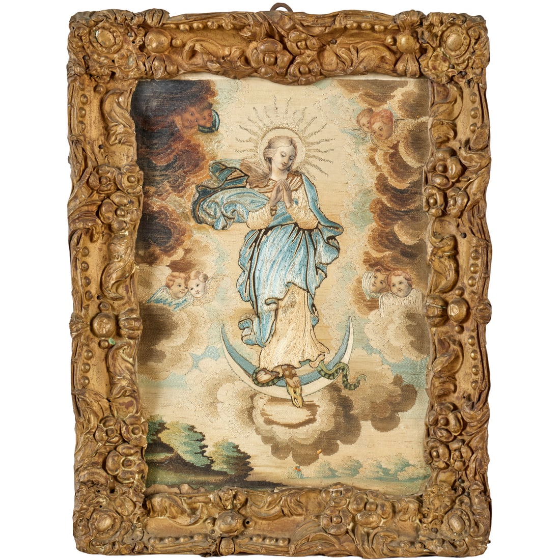 Continental devotional needle-work painting: Continental devotional needle-work painting, 18th/19th c., The Virgin Mary with beatific painted face and metallic thread aureole, standing on a snake, surrounded by painted cherubs, in elaborate tin