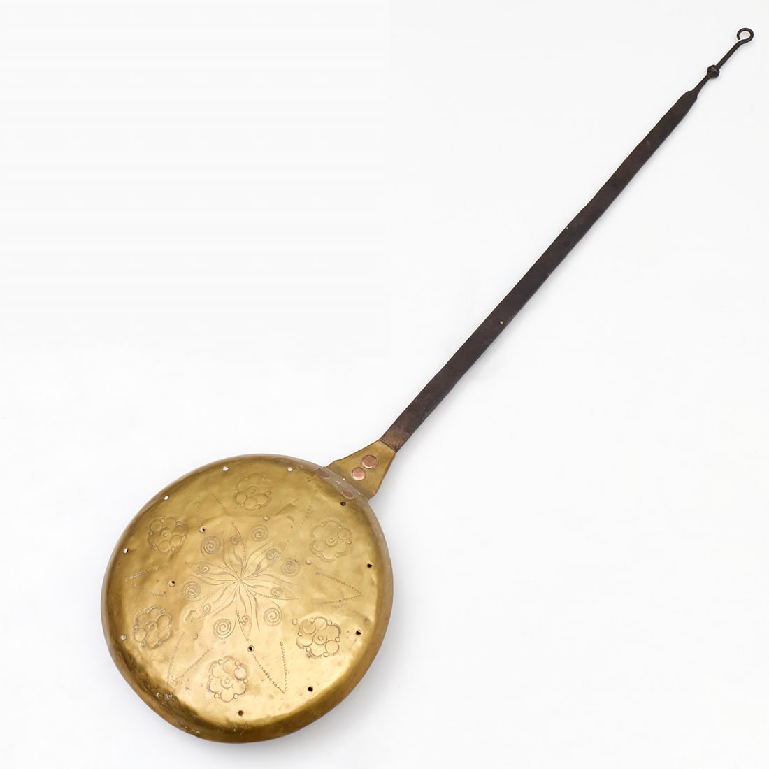 Antique brass and iron bed warmer: Antique brass and iron bed warmer, 19th c., with incised flower decoration, 40.5"l x 11"w Provenance: The Collection of June and Frank Barsalona, NYC