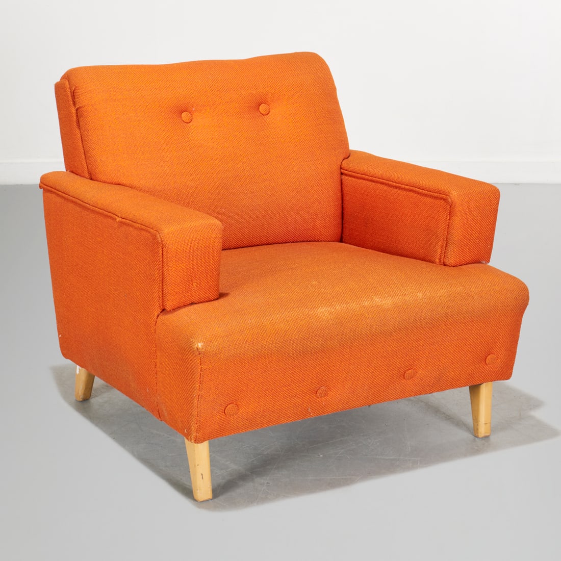 Mid Century Modern orange twill club chair: Mid Century Modern orange twill club chair, Mid 20th c., button tufted back, unmarked, 30.5"h x 32.5"w x 33.5"d