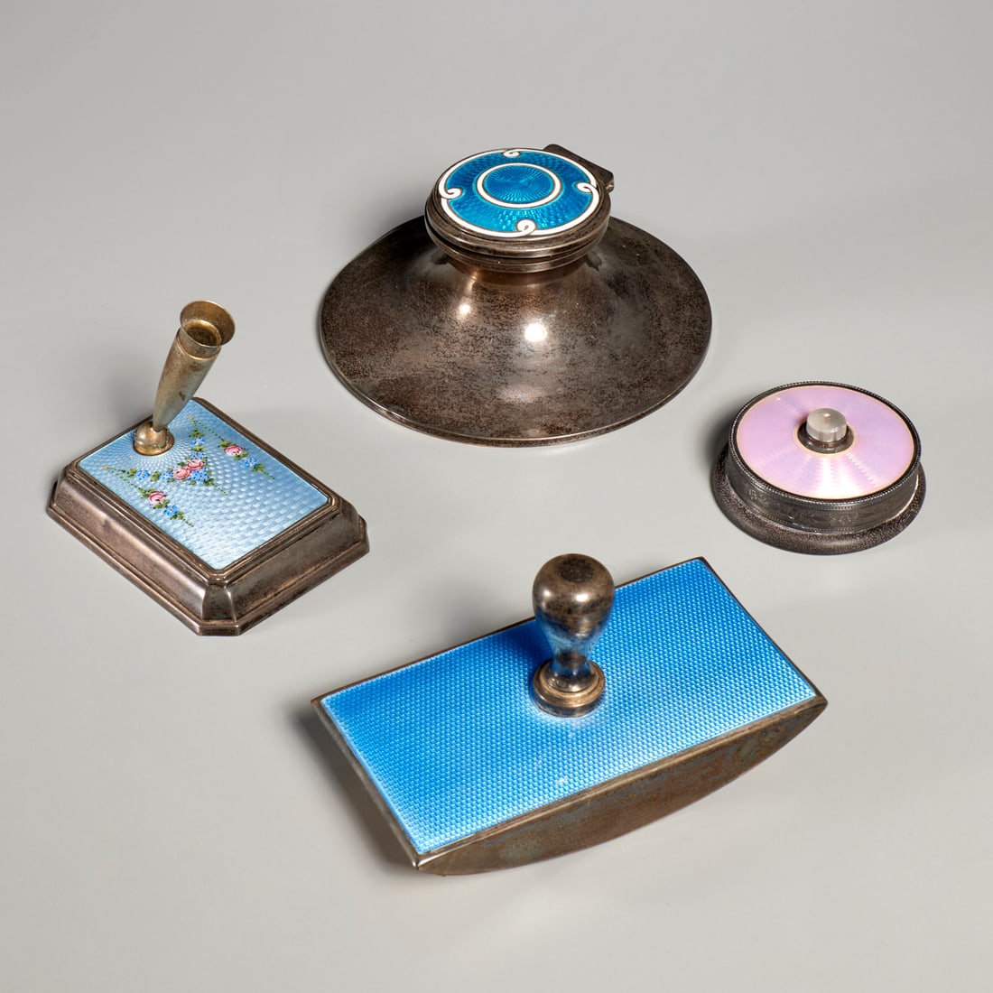 (4) Silver and guilloche enamel desk accessories: (4) Silver and guilloche enamel desk accessories, 19th/20th c., incl. England, blue, pink, and floral guilloche decoration, incl. bell push, rocker blotter, ink stand, quill holder, some fully