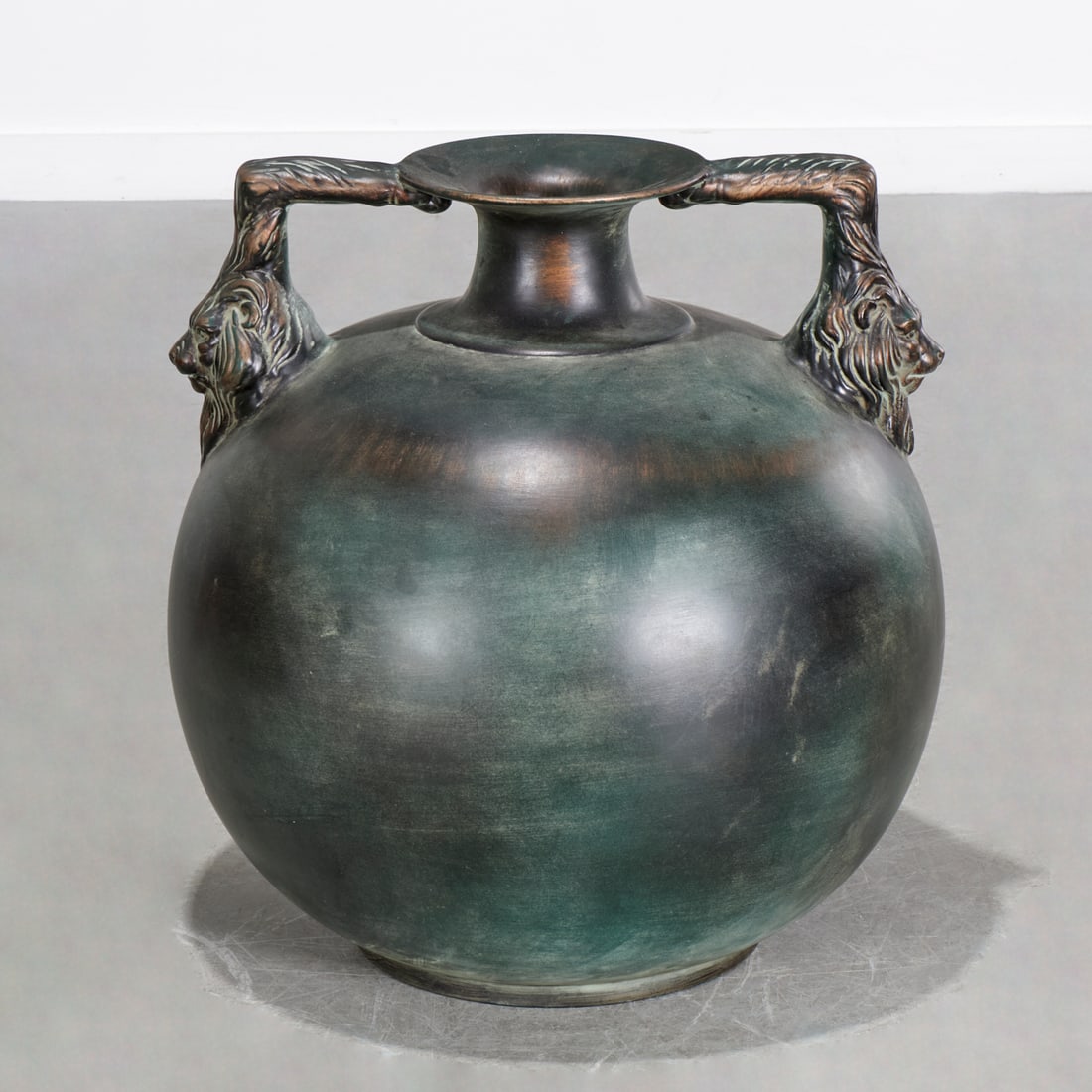 Huge Oggetti ceramic urn: Huge Oggetti ceramic urn, 20th c., Italy, with double lion head handles, marked on underside, approx. 25"h x 24"w x 22"d Provenance: Property from a Prominent NYC Family Foundation