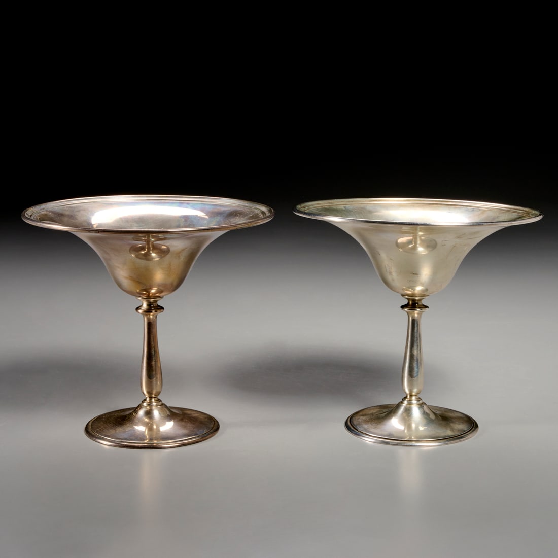 Tiffany & Co, pair sterling silver compotes: Tiffany & Co, pair sterling silver compotes, 20th c., maker's stamp to underside, 5.25"h x 6"dia, approx. 20.3ozt (total) Provenance: A Private Collection: 1095 Park Avenue, NYC