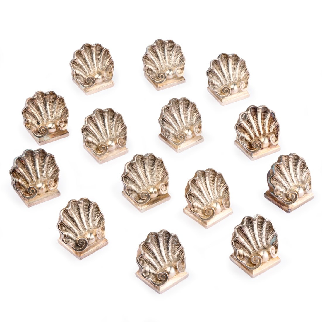 (14) Christofle silver plated place card holders: (14) Christofle silver plated place card holders, 20th c., France, maker's stamp to underside, 1"h x 1"w Provenance: A Private Collection: 1095 Park Avenue, NYC