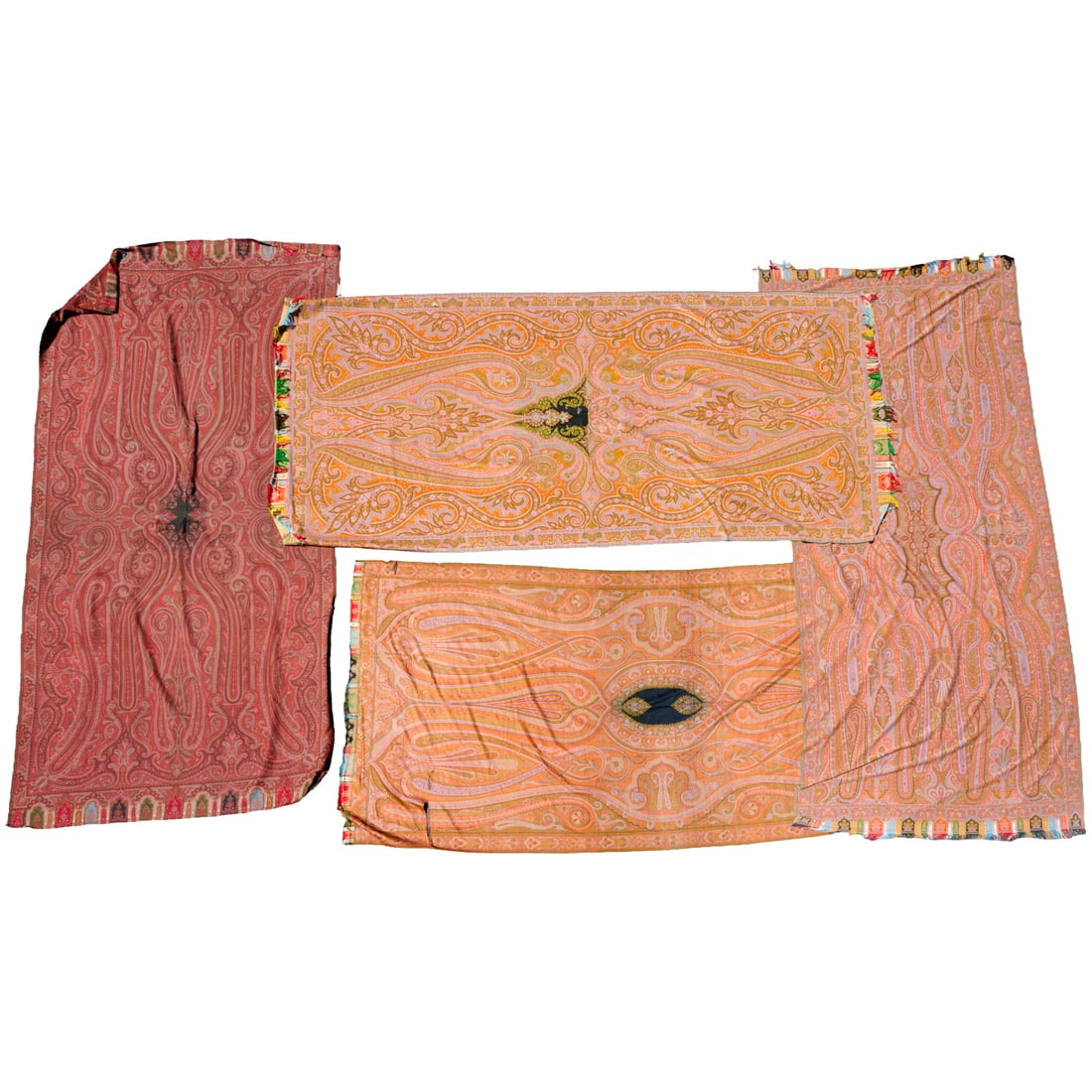 Group (4) antique Paisley shawls, ex Iris Apfel: Group (4) antique Paisley shawls, ex Iris Apfel, 20th c., piano shawls, each in paisley pattern on red ground, approx. 11'9"l x 5'2"w (largest), 11'l x 5'4"w (largest), 10'9"l x 5'2"w (smallest)