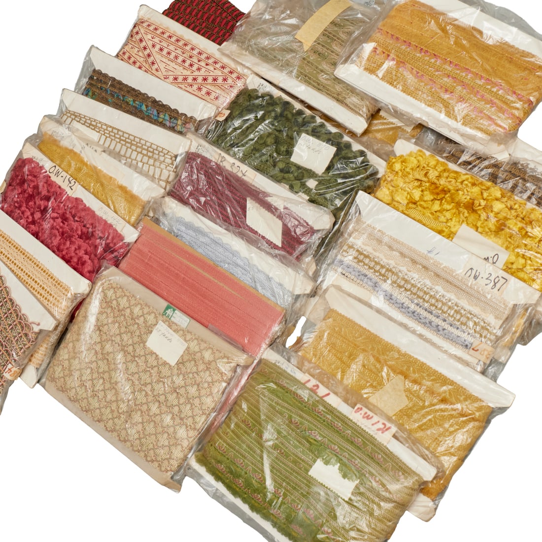 Fine vintage textile trims & finishes, ex Apfel: Fine vintage textile trims & finishes, ex Apfel, 20th c., (20) pieces, various styles and lengths, some Old World Weaver tags, ex Iris Apfel, most approx. 8"h x 12"w (cardboard packages) Provenance: