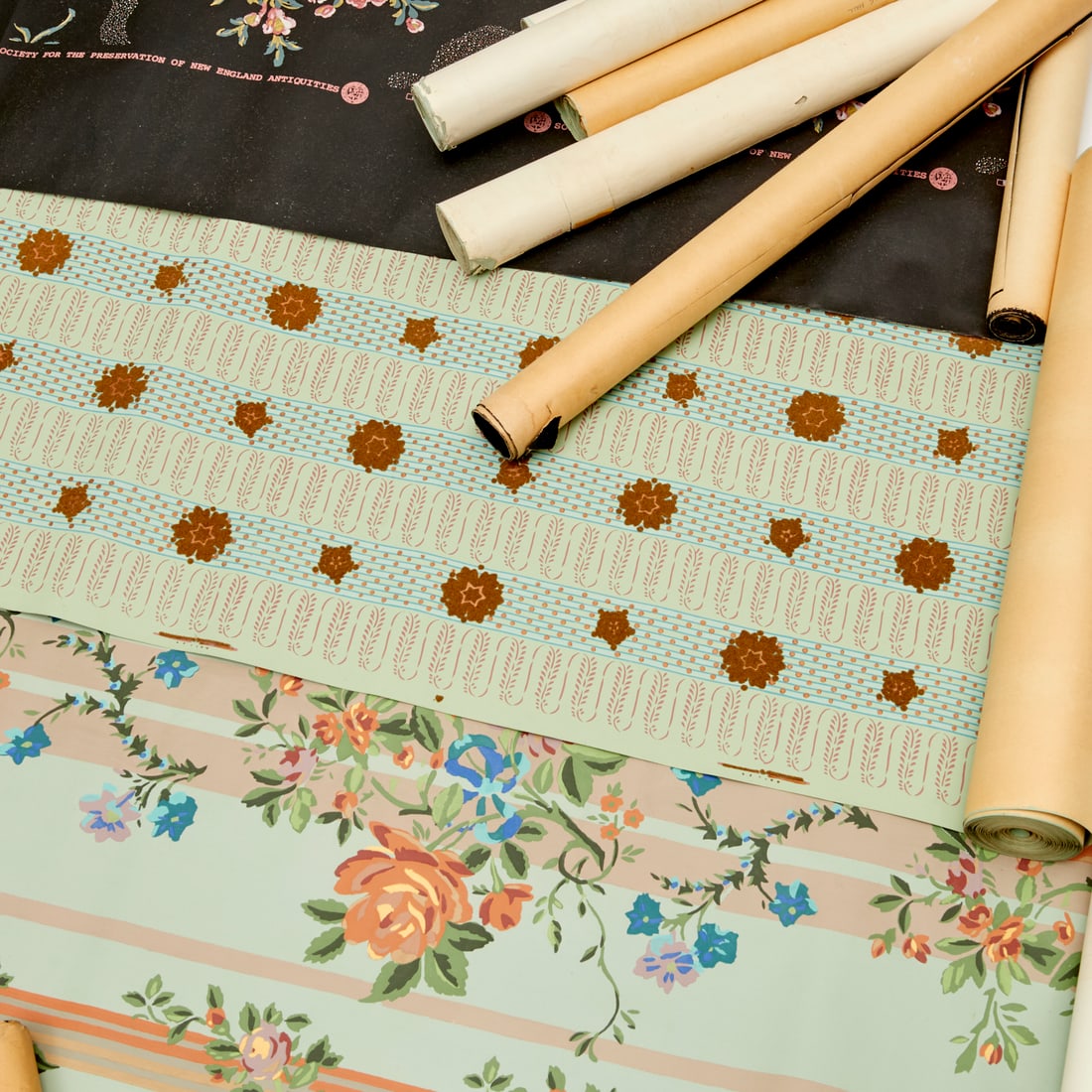 Continental partial wallpaper rolls, ex Apfel: Continental partial wallpaper rolls, ex Apfel, 20th c., incl., Brunschwig & Fils, floral patterns on sage and black ground, some marked "RC a Paris", ex Iris Apfel, 30"w (largest), 25"w (shortest)