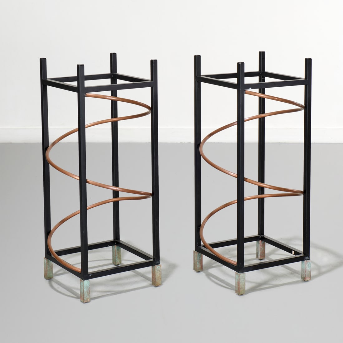 Pace Collection, pair postmodern pedestals: Pace Collection, pair postmodern pedestals, c. 1980s-1990s, square form patinated metal pedestals, with tubular twist form openwork design, unmarked, 33"h x 12"squ