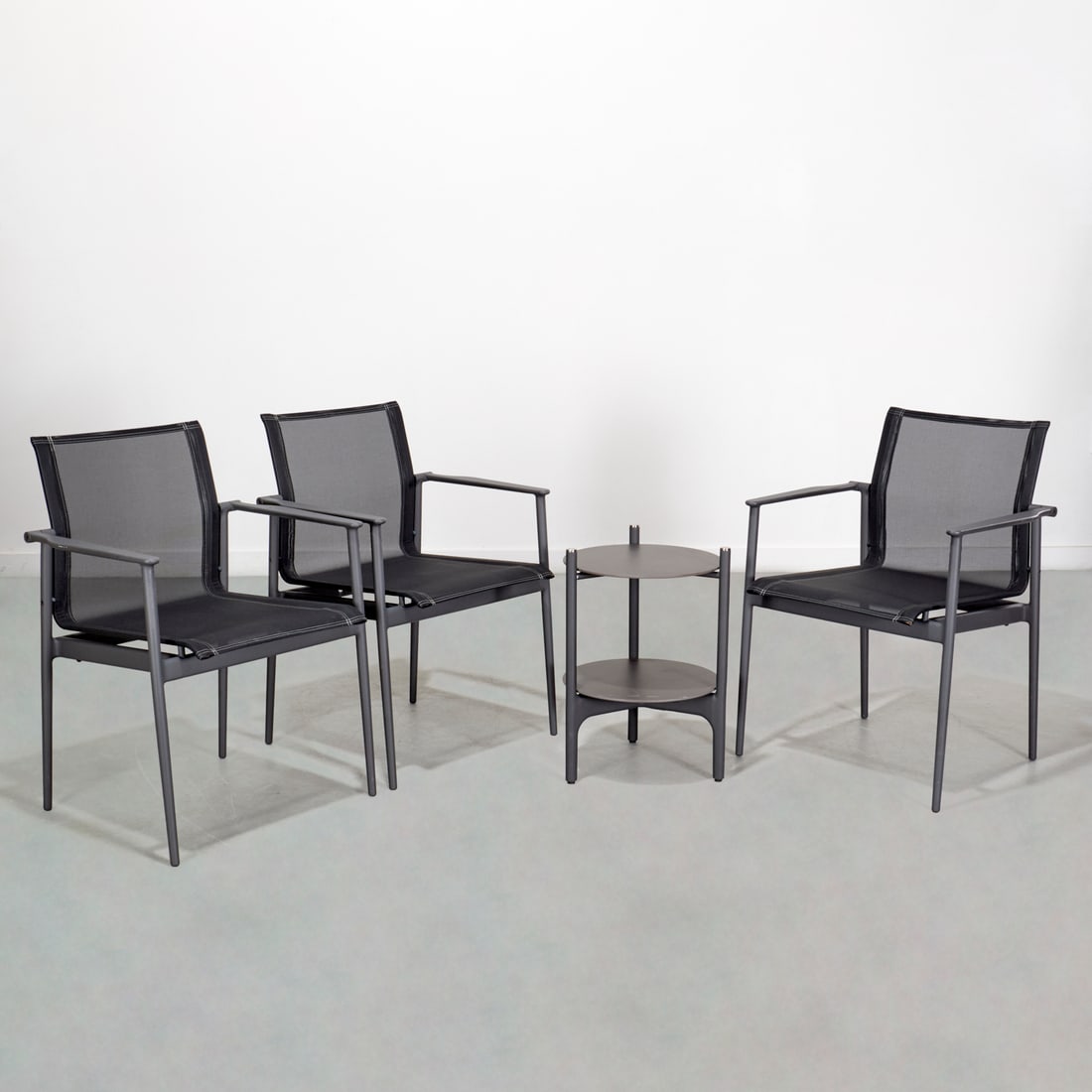 Gloster outdoor armchairs and side table (1 of 8)