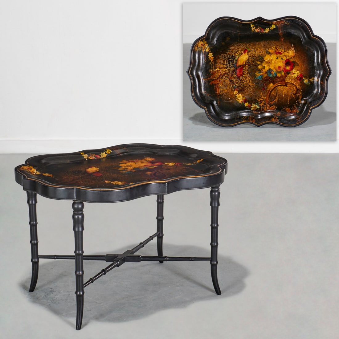 Victorian papier mache tray top coffee table: Victorian papier mache tray top coffee table, 20th c., bird and floral decorations to tabletop, on black patinated faux bamboo stand, unmarked, 20.5"h x 32.5"w x 24.5"d