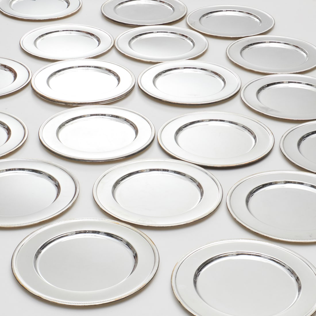 Set (24) silver plated chargers (1 of 7)