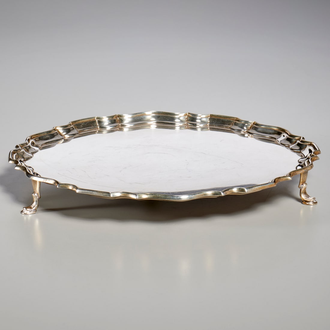 Tiffany & Co., sterling silver salver: Tiffany & Co., sterling silver salver, c. 1908, London, maker's stamp and hallmarks to underside, 1.25"h x 10.25"dia, approx. 19.9ozt