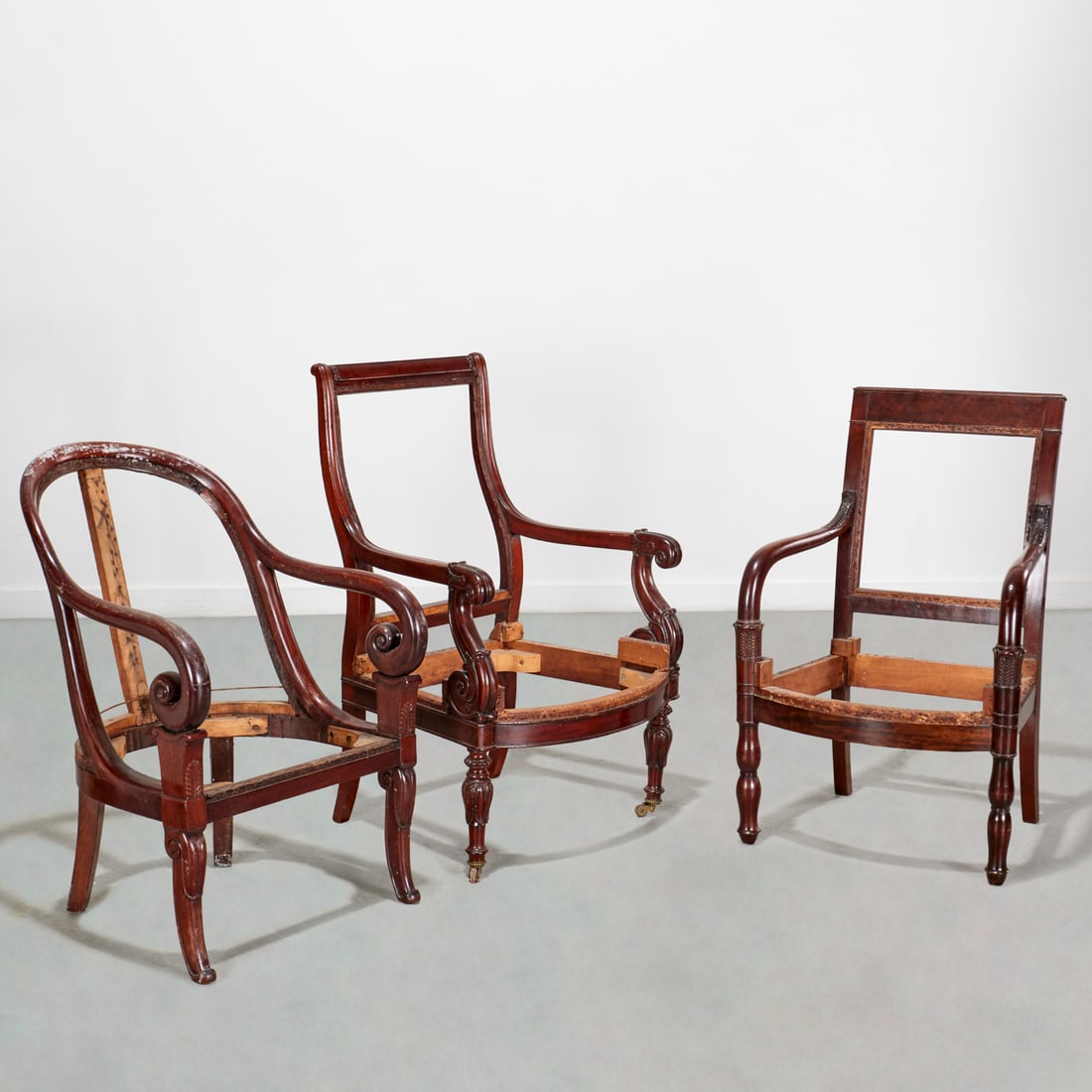 (3) Empire chair frames, incl. Jeanselme: (3) Empire chair frames, incl. Jeanselme, 19th c., France, one example stamped "Jeanselme" (39"h x 23.5"w x 21.5"d (largest), 34"h x 22"w x 26"d (smallest)