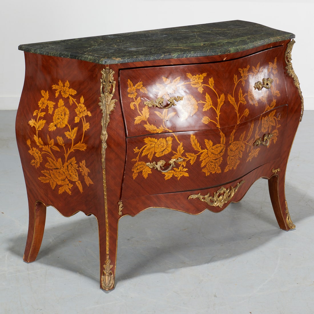 Louis XV style marble top marquetry bombe commode: Louis XV style marble top marquetry bombe commode, 20th c., floral inlaid decoration, gilt metal mounts and hardware, unmarked, 35.5"h x 46.5"w x 21.5"d