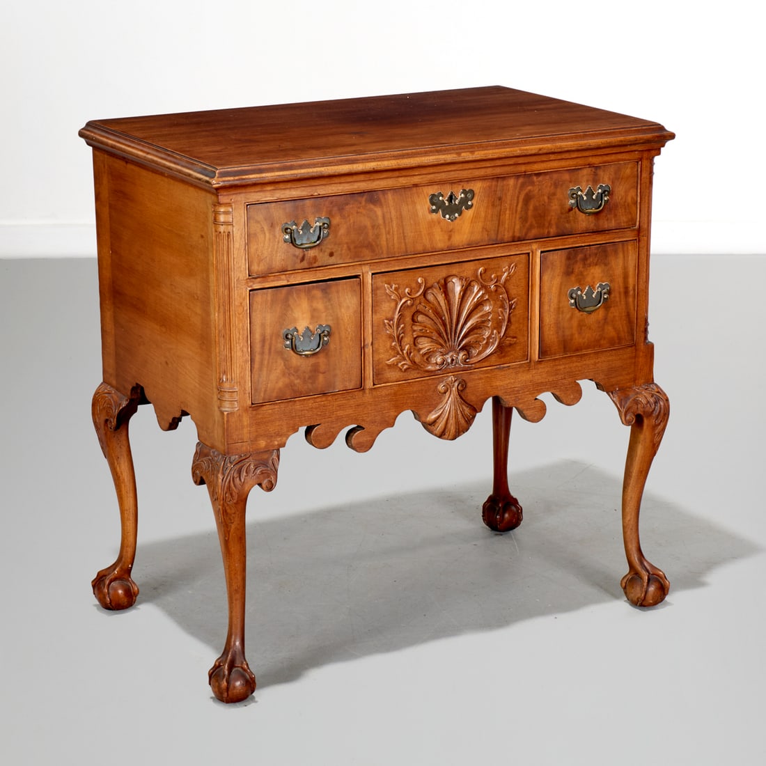 Antique Philadelphia Chippendale style lowboy: Antique Philadelphia Chippendale style lowboy, 19th c. or older, with brass hardware, raised on ball and claw feet, 37"h x 30.25"w x 19"d