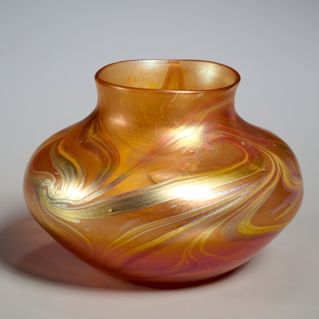 Louis Comfort Tiffany, Favrile glass vase: Louis Comfort Tiffany, Favrile glass vase, Early 20th c., USA, iridescent swirled design, signed "LCT, G1779" to underside, 5"h x 6"dia