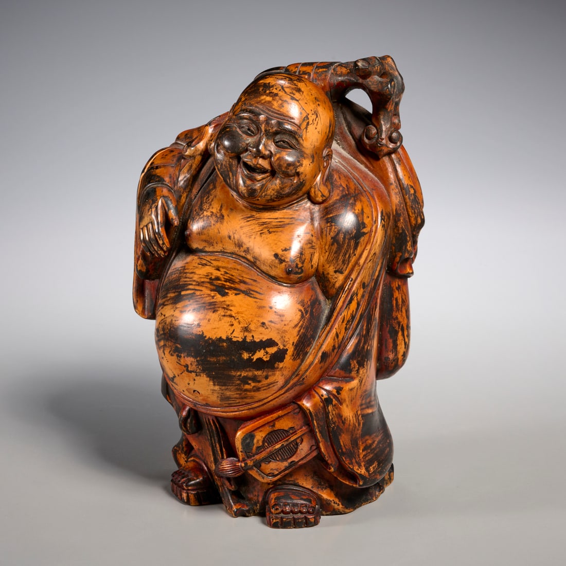Chinese carved boxwood Budai figure: Chinese carved boxwood Budai figure, Qing Dynasty (19th c.), Standing Laughing Buddha, previous owner labeled "Tao Kuang, 1821-1851" on underside, 8"h x 5"w x 4.5"d