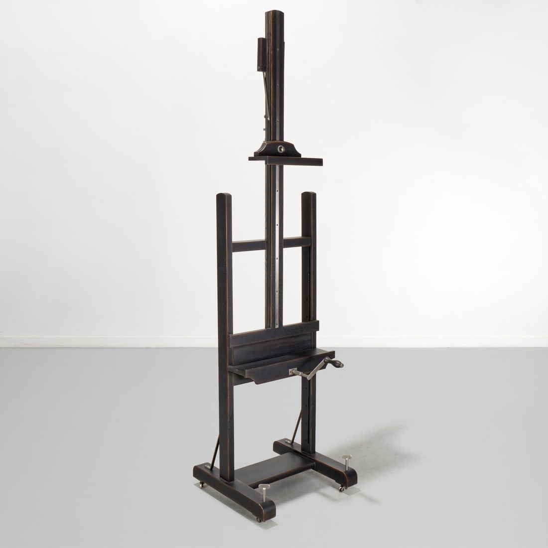 Restoration Hardware, large television easel: Restoration Hardware, large television easel, 21st c., hardwood frame in ebony finish, with adjustable height, approx. 94.5"h x 23.5"squ