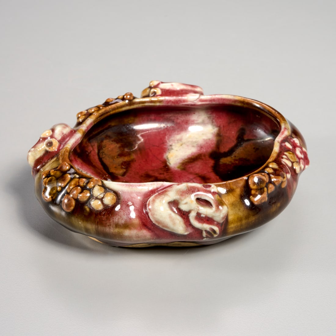 Chinese flambe glazed porcelain coupe: Chinese flambe glazed porcelain coupe, Qing Dynasty (19th/20th c.), with mice and floral decoration to rim, 1.25"h x 5"l x 4"w Provenance: The Estate of Camilla Dietz Bergeron, NYC