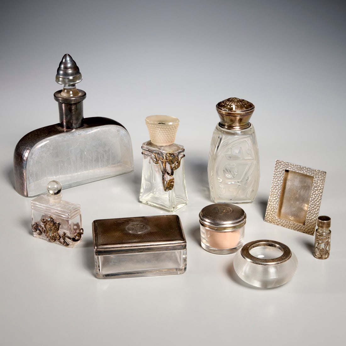 Assembled glass and silver vanity group (1 of 8)