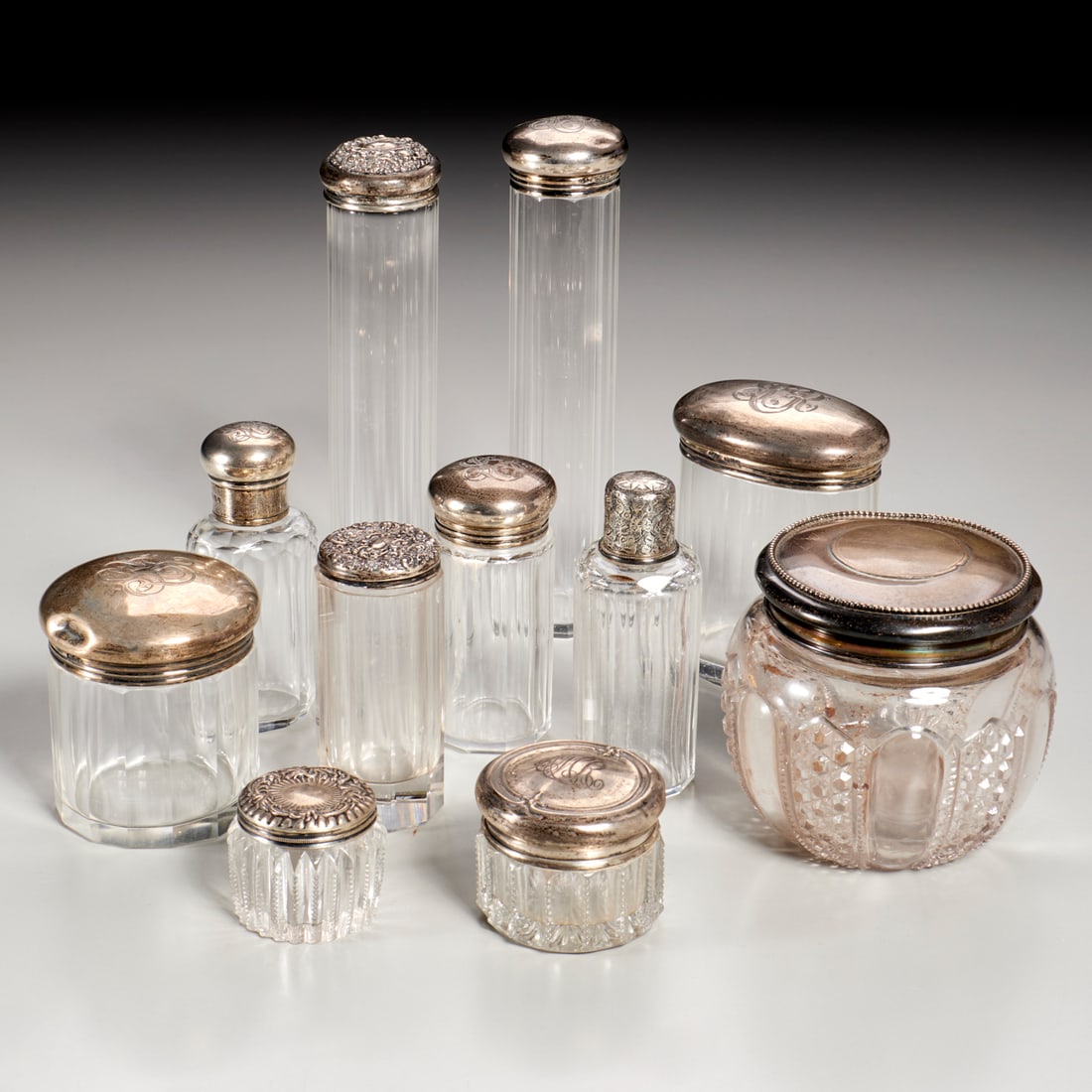 Collection sterling lidded vanity bottles and jars (1 of 7)