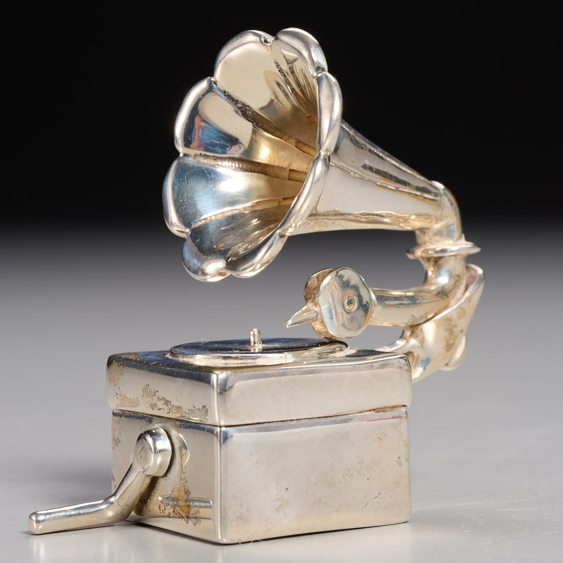 Tiffany & Co. sterling silver novelty box: Tiffany & Co. sterling silver novelty box, 20th c., USA, box in the form of a Gramophone, with hinged trumpet and rotating crank, marked "Tiffany & Co. 925" underneath, 2.25"h x 2.25"l x 1"w, approx.