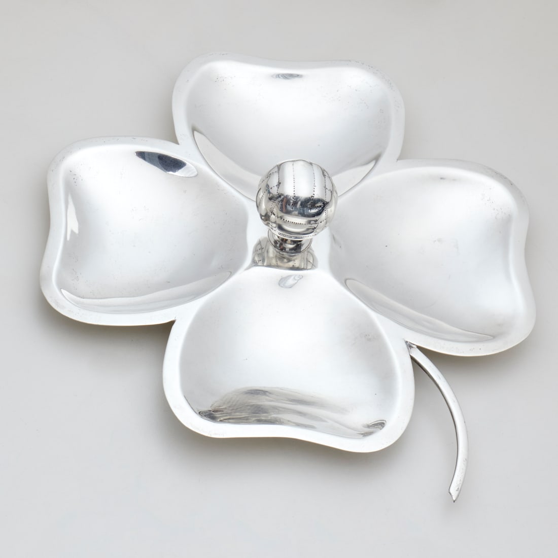 Juvento Lopez Reyes, sterling silver clover dish: Juvento Lopez Reyes, sterling silver clover dish, 20th c., Mexico, stamped "Sterling, 925", with maker's mark to underside, 9.5"l x 8"w, approx. 9.4ozt Provenance: The Collection of June and Frank