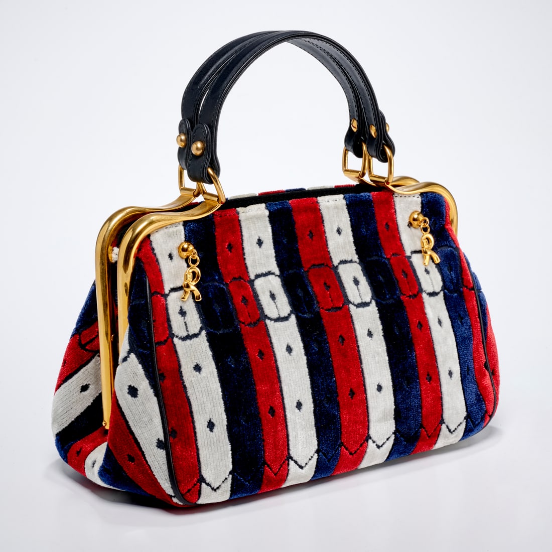 Roberta Di Camerino velvet & leather frame handbag: Roberta Di Camerino velvet & leather frame handbag, c., 1970s, in tri-color red, white & blue velvet, with gold tone hardware, dual handles in navy leather, lined interior with logo tonal fabric, with