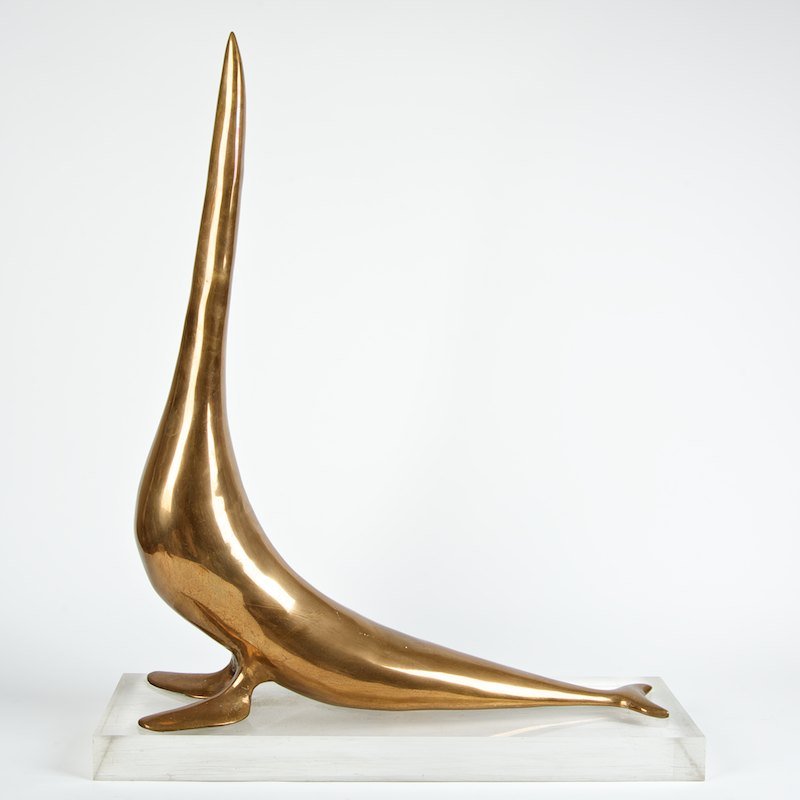 Attr. to Manuel Carbonell (1918-2011, Cuban), sculpture: Attr. to Manuel Carbonell (1918-2011, Cuban), sculpture, Sea lion, bronze with gold patina, unique cast, signed "MC", on acrylic base, 29"h x 22.5"l x 5.5"w Provenance: Schoneman Galleries, NY