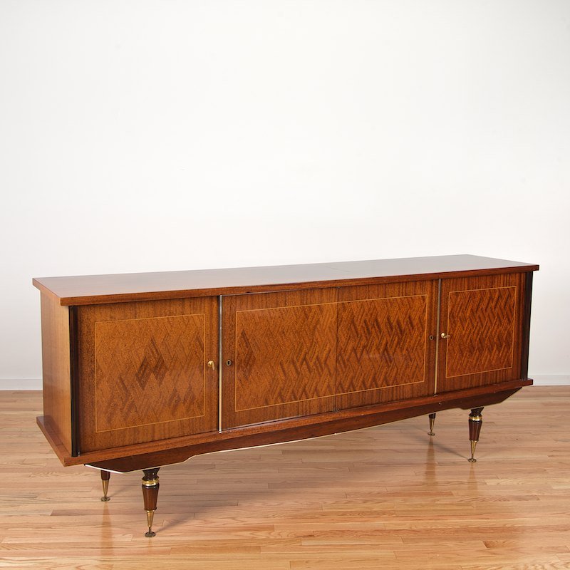 French Art Deco buffet by Seguin and Florian Papp: French Art Deco buffet by Seguin and Florian Papp, Circa 1940s and adapted, parcel gilt parquetry case, with old label "Seguin", base modified by Florian Papp, 40"h x 91"l x 20"d
