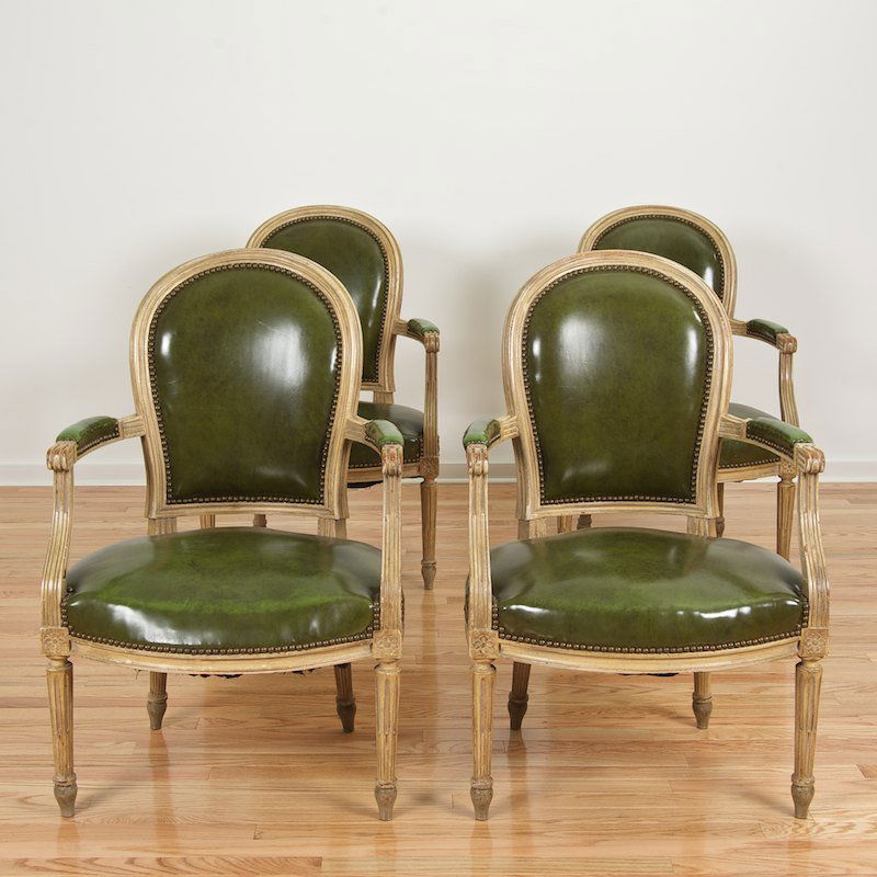Set (4) Louis XVI style cream painted fauteuils: Set (4) Louis XVI style cream painted fauteuils, First half 20th c., green leatherette seating, 36.5"h x 24"w x 21"d