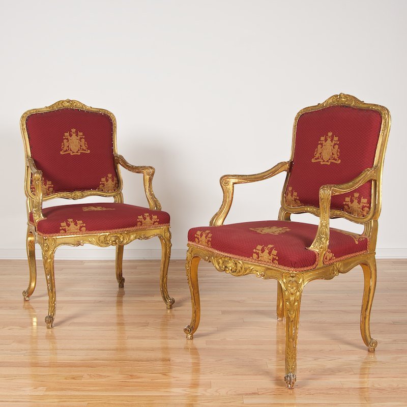 Pair Bertram & Son Louis XV style giltwood armchairs: Pair Bertram & Son Louis XV style giltwood armchairs, 19th c., coral/gold upholstery, paper label "Bertram & Son, Dean St, Oxford St W", 39.5"h x 24.5"w x 20"d