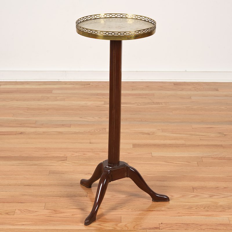 Directoire brass mounted mahogany gueridon: Directoire brass mounted mahogany gueridon, 19th c., brass galleried white marble top, tripod base, 31"h x 12.5"dia.