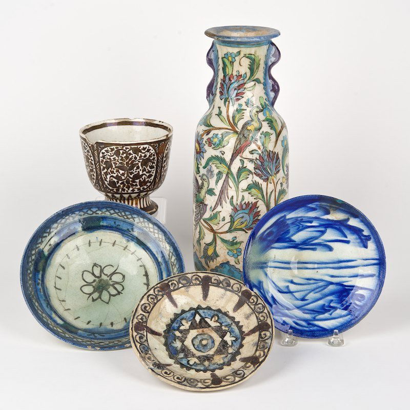 Group antique Persian glazed earthenware: Group antique Persian glazed earthenware, 17th/18th/19th c., (5) pcs., incl. footed bowl, 3 dishes and vase, largest: 14"h x 5"dia., smallest: 1.5"h x 6.75"dia.