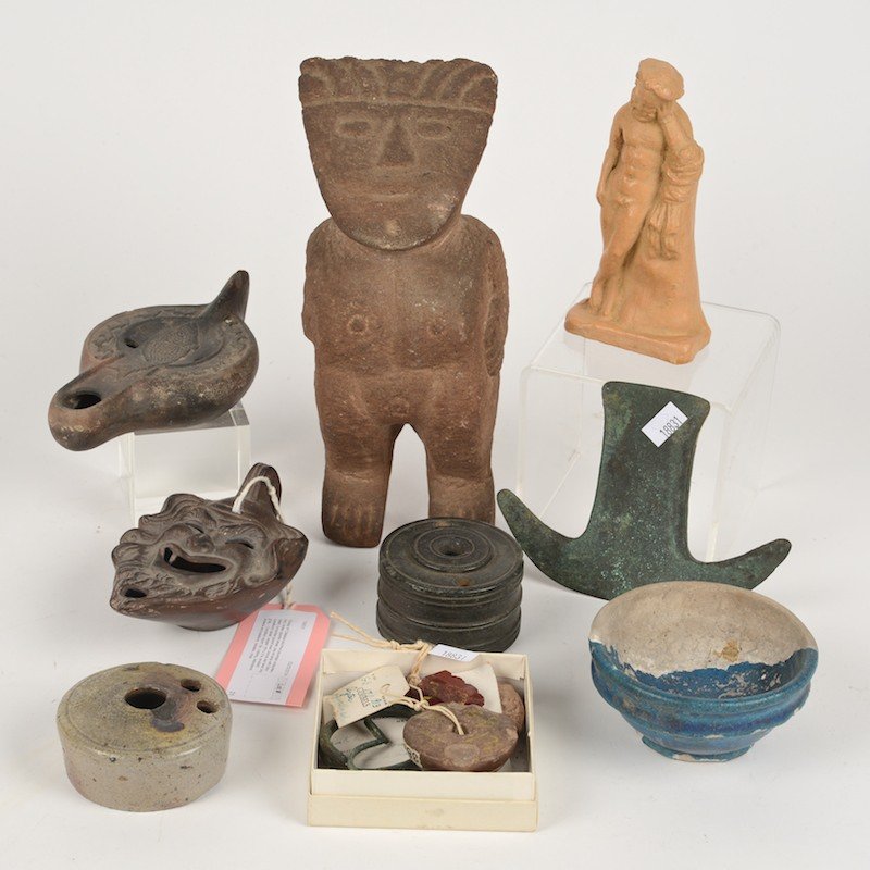 Group Classical and Pre-Columbian antiquities: Group Classical and Pre-Columbian antiquities, Incl. Aztec spindle wheel, satyr head lamp, turquoise glazed bowl, bronze axe head, tiny cuneiform style tablet, largest: 10"h x 3"w, smallest: 1"sq.