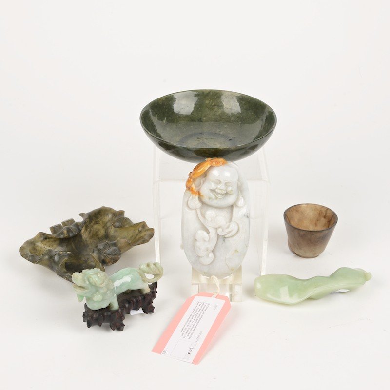 (6) Chinese jade and soapstone carvings: (6) Chinese jade and soapstone carvings, 19th/20th c., incl. carved foo dog on hardwood stand, leaf form bowl, largest: 4" h x 3" w, smallest: 1.5"h, 2" dia.