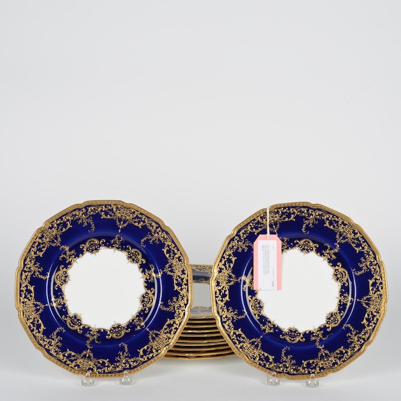 Set (12) Royal Doulton porcelain service plates: Set (12) Royal Doulton porcelain service plates, 20th c., retailed by Marshall Field & Co., cobalt blue with raised gold, 10.5"dia.