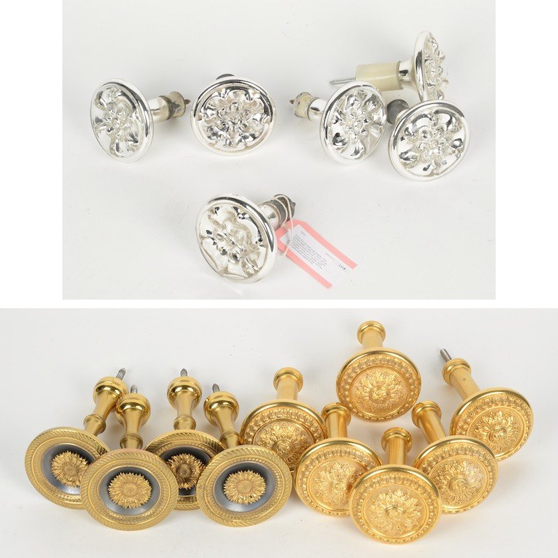 Group (16) gilt metal and mercury curtain tiebacks: Group (16) gilt metal and mercury curtain tiebacks, Floral medallion design, (2) pairs 4" dia. x 6.25"l, gilt brass with black (3) pairs all-over gilt brass, 4" dia. x 5.5" h, (3) pairs 3.75"dia. x 5"