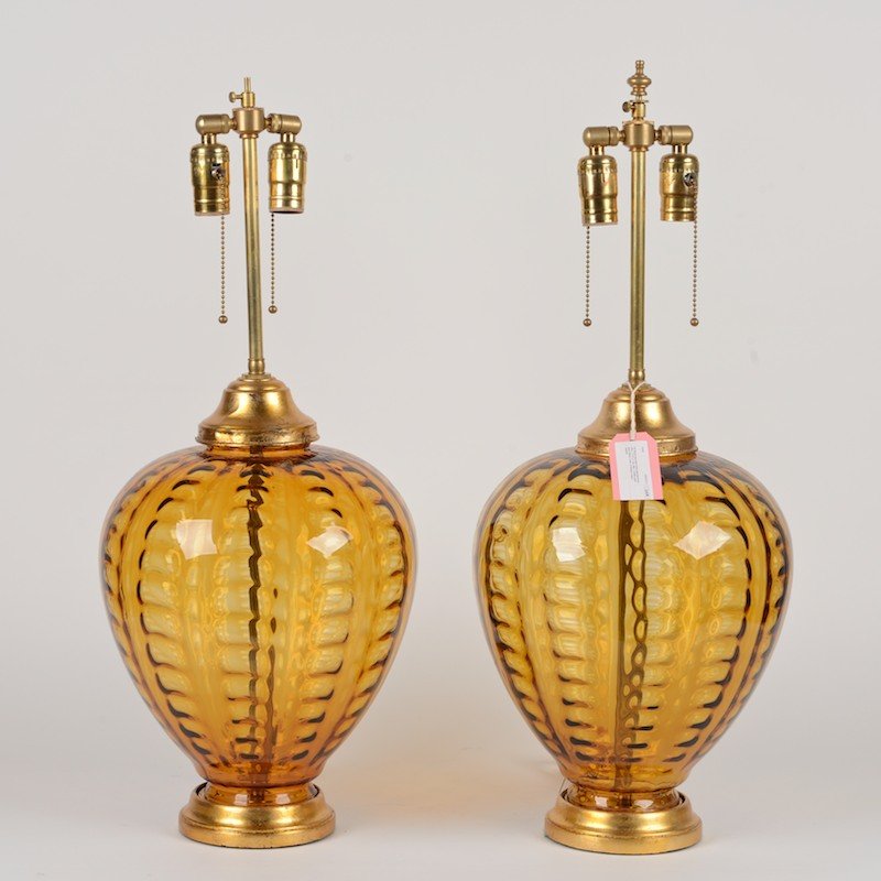 Pair Raymor style blown amber glass table lamps: Pair Raymor style blown amber glass table lamps, 20th c., 27.5"h x 11"dia. (total)