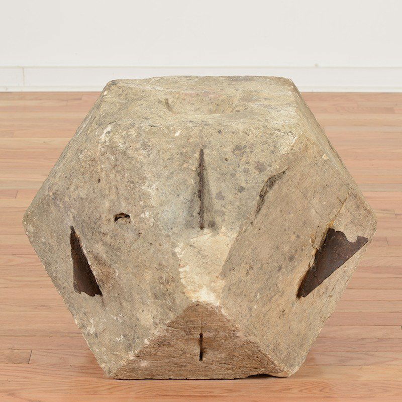 Antique carved limestone polyhedron sun dial: Antique carved limestone polyhedron sun dial, 17th/18th c., with iron indicators, 18"squ. Provenance: The Estate of Amy Perlin, NY