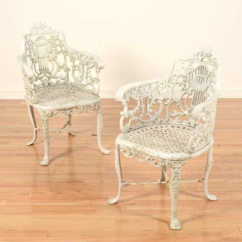 Pair Victorian white painted cast iron chairs: Pair Victorian white painted cast iron chairs, Late 19th c., lyre backs, 32"h x 20.5"w x 20"d