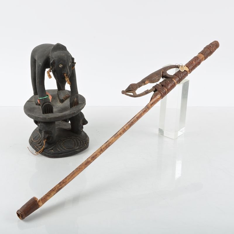 Oceanic tribal spear thrower and carved figure: Oceanic tribal spear thrower and carved figure, 20th c., (2) pieces, possibly Atlatl, Papua New Guinea, thrower with old tag "Count Warner" (?), larger: 31"l Provenance: from a private New York Collec