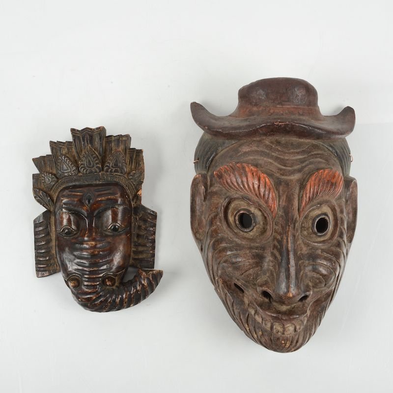 (2) Himalayan carved, painted wood masks: (2) Himalayan carved, painted wood masks, 20th c., possibly Nepalese, largest: 14.25"h x 9.5"w x 4.5"d Provenance: From the Rona Family Collections, Princeton, NJ