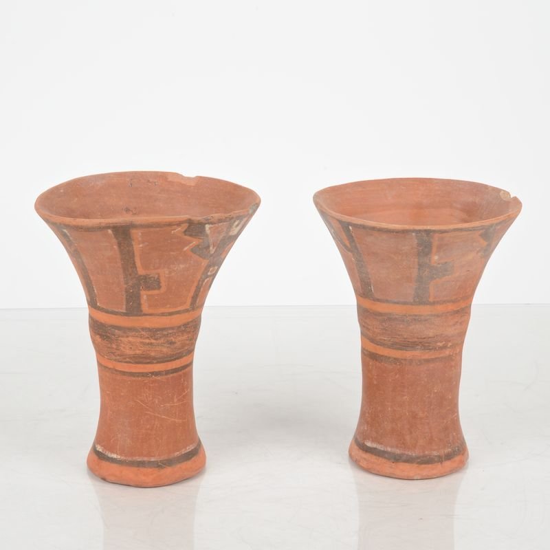 (2) large Pre-Columbian painted pottery kero: (2) large Pre-Columbian painted pottery kero, Possibly Huari, with geometric decoration, 8"h x 6"dia. Provenance: the Estate of Dr. Marc Bernheim, NY; probably Parke-Bernet Galleries, 1970s, lot 153