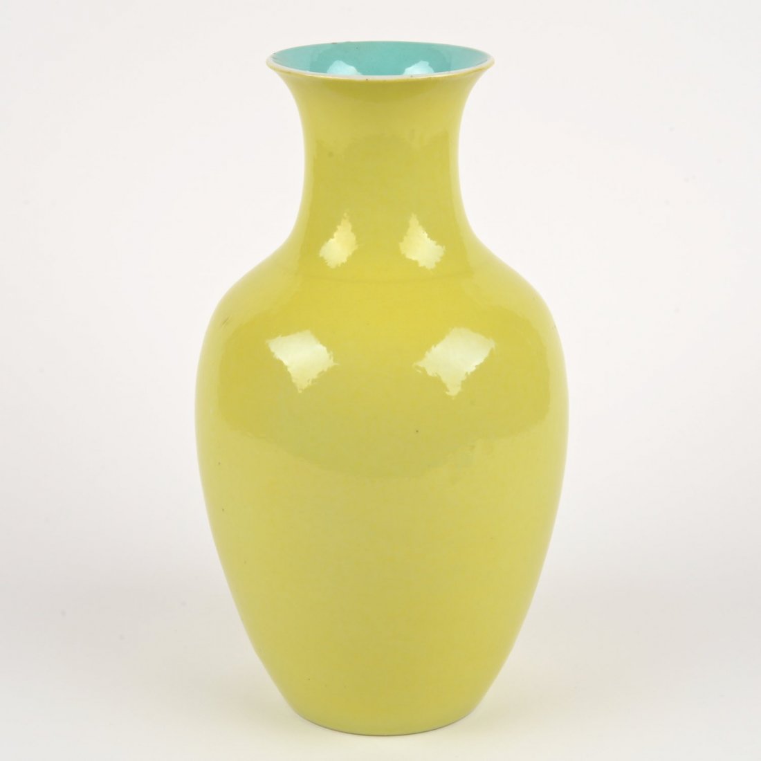 Chinese yellow glazed porcelain vase: Chinese yellow glazed porcelain vase, Late 19th/20th c., robin's egg glazed interior, 12.25"h x 6.25"dia. Provenance: the Estate of Edgar M. Bronfman, New York, NY