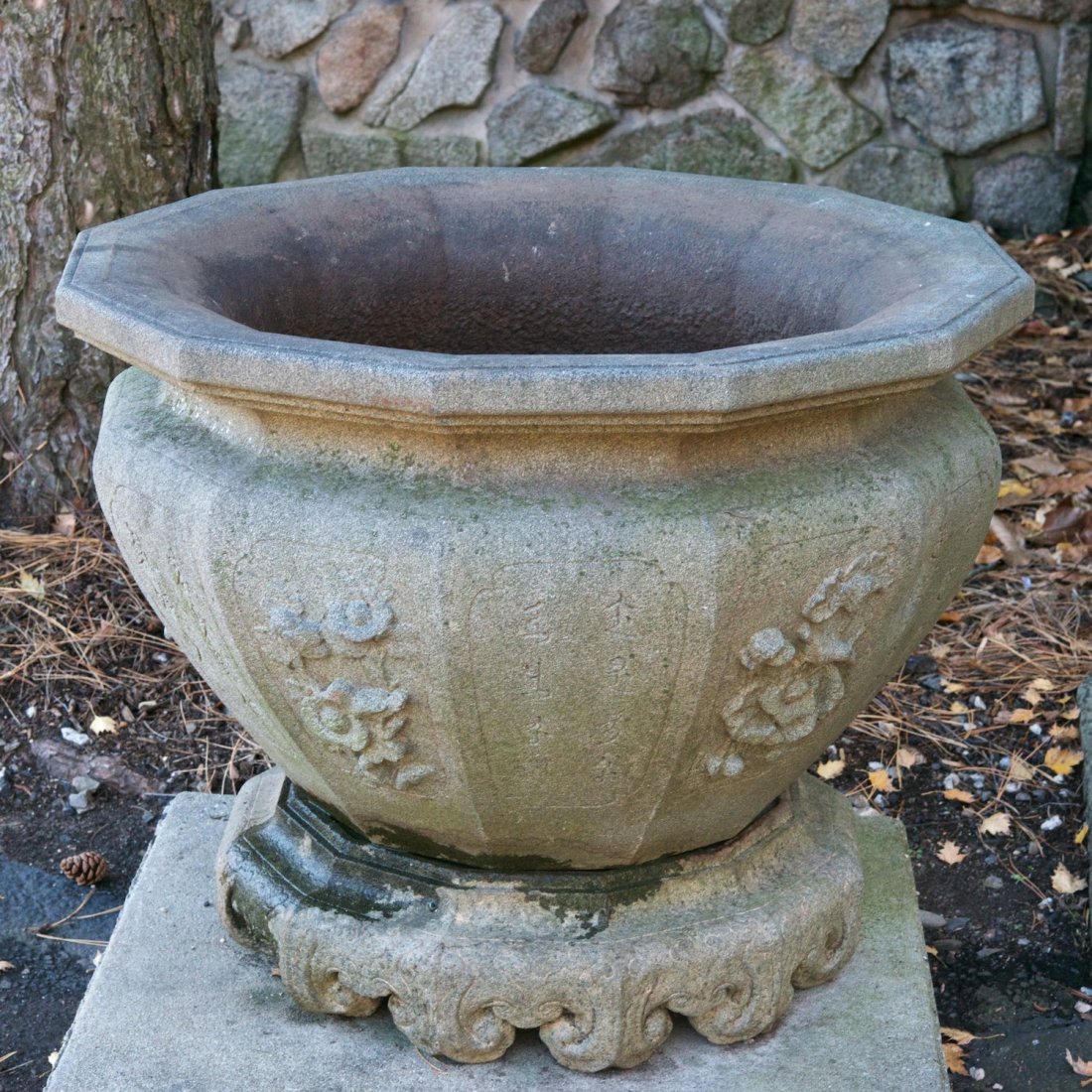 Large Chinese carved gray stone jardiniere: Large Chinese carved gray stone jardiniere, Possibly Ming Dynasty, in 2 parts, carved with alternating shi poems and prunus panels, 26"h x 32.25"dia. Provenance: The Estate of Doris Duke: Duke Farms, 